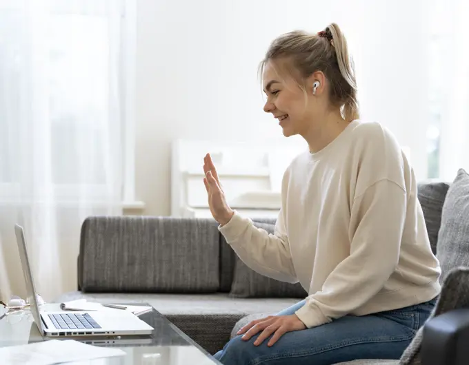 Young Female Student Listening Her English Teacher